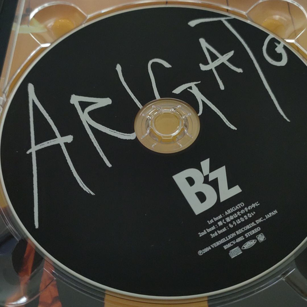 B'z/ARIGATO - メルカリ
