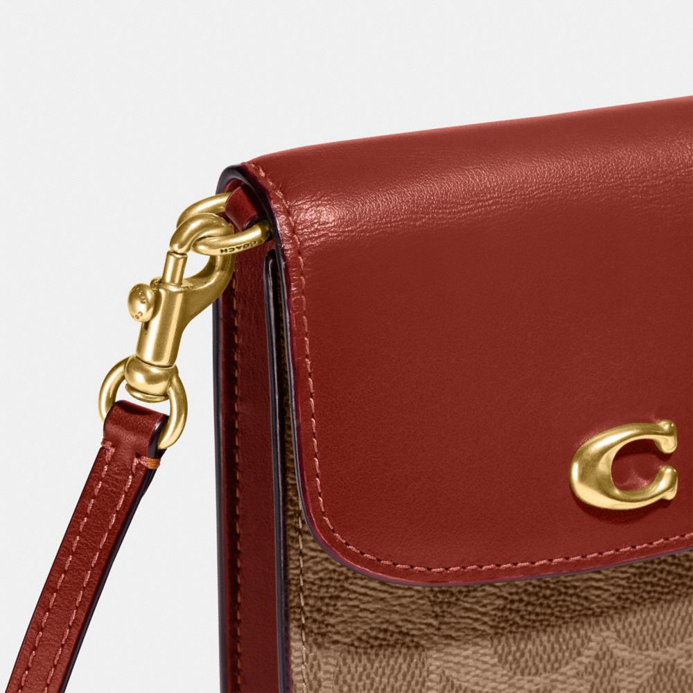 公式】COACH – コーチ | フォーン クロスボディ・シグネチャー キャンバス