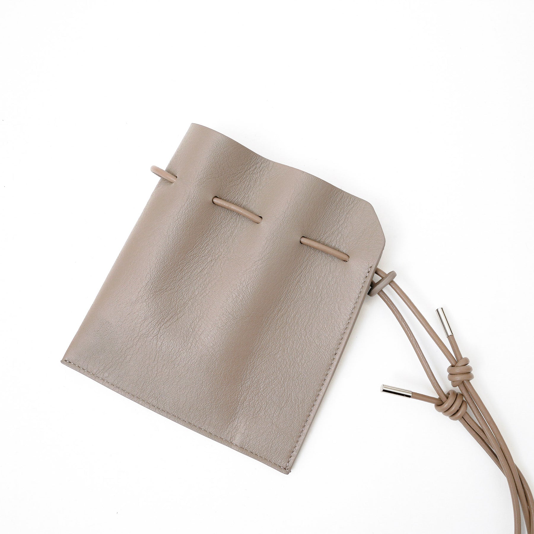 HERRIE KINCHAKU POUCH - XXS / RAPTO FLEX｜レザー ミニ巾着ポーチ 首