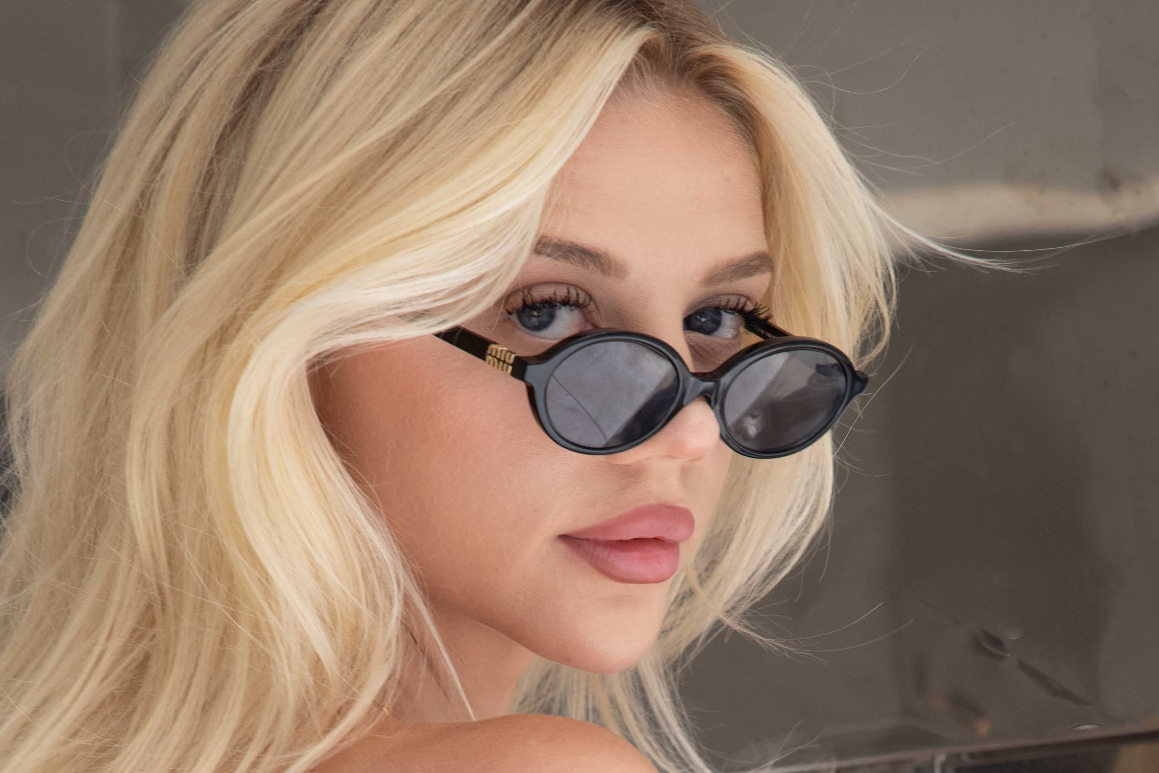 Buy Miu Miu MU04ZS 1AB5S0 Women's Sunglasses Black at best price